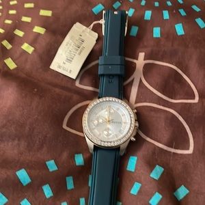 Fossil women green strap Watch new.  Need battery